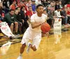 Wasilla guard Kobe Brown drives the ball toward the basket during a 76-66 overtime victory over rival Colony March 1, 2016, at Wasilla High School. Brown scored 29 points in the win. Courtesy