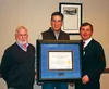 Mat-Su Regional Medical Center board members, from left, Bill Hogan, Dr. John Boston and CEO John Lee display the framed certificate announcing the hospital’s recognition by The Joint Commiss