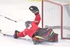 Wasilla goal tende Jesse Hugli stretches to make a save during
Friday's game against the West Valley Wolfpack. ROBERT
DeBERRY/Frontiersman