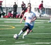 Palmer senior Miracle Burton moves the ball across the field during Palmer's game against the Kenai Kardinals last weekend at Colony High School. ROBERT DeBERRY/Frontiersman.com