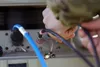 A signal support systems specialist with the 41st Infantry Brigade Combat Team, Oregon Army National Guard, assembles a ground satellite terminal, Feb. 27, 2020, at the Joint Multinational Re