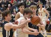 Soldotna's Zac Buckbee and Wasilla's Eli Cox battle for the ball Friday, March 8, 2024, at the Northern Lights Conference tournament at Soldotna High School in Soldotna, Alaska. Jeff Helminia
