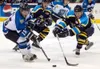 Kelly Gillin/Wenatchee World Wenatchee's Corbin Brown, left and
Logan Maly of the Alaska Avalanche battle for a loose puck during
Alaska's 4-3 overtime win over the Wild in Wenatchee, Wash., 
