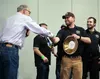 James ‘Dr. Fermento’ Roberts presents the second place trophy in the beer category to Glacier Brewhouse during the Craft Beer and Barleywine Festival at the Dena’ina Center in 2020. Courtesy 