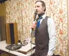 ROBERT DeBERRY/Frontiersman Square dance caller Gary Feaster
keeps the dancers moving Friday at the Salvation Army building in
Palmer.