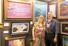 GREG JOHNSON/Frontiersman — George Shell of Big Lake-based
Custom Concrete Countertops talks with Mike Dillingham at the home
show. Dillingham was attracted to the booth because he has plans 