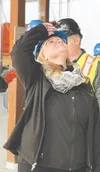 MY House Board of Directors Treasurer Stephanie Berta, takes in the progress of construction at the Carson-Cottle Center in Wasilla during a recent tour of the facility. The center is expecte