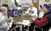 From left, Palmer seniors Frank Bird, Terri Dorman, Jim Deming
and Bernard Niemann enjoy a pinochle game at the Palmer Senior
Center on Wednesday. Photo by Mary Spears/For the Frontiersman.