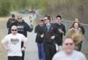 Joshua Smith carries the Special Olympic torch during Saturday's
Law Enforcement Torch Run in Wasilla. This was the fifth year the
Valley has participated in the fundraiser for Special Olympi