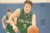 ROBERT DeBERRY/Frontiersman Colony Knight Jaron Murphy drives
the ball down the court during Tuesday's game against the Palmer
Moose at Palmer High School.