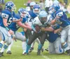 ROBERT DEBERRY/Frontiersman Chugiak fullback Ben James tries to
power his way through the Palmer defense during the Mustangs’ 31-21
come-from-behind victory over the Moose Saturday at Macheta