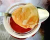 A SCOBY might look a little ick, but its micro-organisms will help turn your tea into an even healthier, fermented beverage.