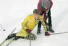 Susitna Valley senior Galen Johnston struggles to his feet
following the boys' freestyle race Friday at the ASAA Alaska Nordic
Ski Championships. A fall during the race knocked the wind out o