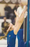 Palmer's Jenna Arlow gets her finger tips on the ball during a
game against the Homer Mariners at Palmer High School. (ROBERT
DeBERRY/Frontiersman)