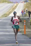 David Kiplagat cross the finish line in the 2010 Curtis C.
Menard 5K Memorial Run Saturday morning. Kiplagat finished with a
time of 15:10.8. (ROBERT DeBERRY/Frontiersman)