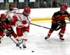 Wasilla's Ethan Hoyt moves the puck forward during a game against Wasilla. Bruce Eggleston/matsusports.net