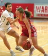 Wasilla's Meilee Merchant drives to the basket. Bruce Eggleston/matussports.net