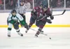 Alaska Avalanche forward Jordan Watt puts pressure on Fairbanks
forward Alec Hajdukovich during Thursday’s 3-0 loss to Fairbanks at
the MTA Events Center in Palmer. ROBERT DeBERRY/Frontiersma