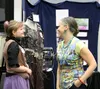 Palmer High senior Miriam Feldman chats with art teacher Anna Folsom during the school's annual IB art show Friday, April 12, 2024, at Palmer High School. Jeremiah Bartz/Frontiersman