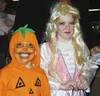 Two youngsters are dressed up and ready to go Trick-or-Treating
at Halloween Hollow at the Alaska State Fair grounds. Photo by JOEY
BERNIER/For the Frontiersman.
