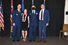 From left to right, U.S. Air Force Col. Ralph “Eddie” Taylor, Pacific Air Forces director of Manpower, Personnel and Services, his wife Nani Taylor, his son Maj. Vincent Taylor, 56th Air Comm