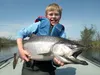 A young angler shows of his catch. Courtesy of Andy Couch