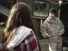 Sgt. 1st Class Jason Ekeland, Alaska Army National Guard Recruiting and Retention section chief, speaks to a possible Army National Guard applicant Oct. 17, 2017, about educational benefits a