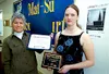Palmer Superior Court Judge Beverly Cutler presents an award to
Sarah Jones for her winning work on this year's Alaska Youth Court
poster contest. WILLIAM WOODY/ Frontiersman