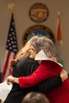 Mayor Glenda Ledford hugs Wasilla City Clerk Jamie Newman after being sworn into office for a second term J. David McChesney/Frontiersman