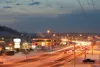 ROBERT DeBERRY/Frontiersman Rush-hour traffic moves along at a
steady pace Monday evening along the Parks Highway in Wasilla.
According to Deputy Wasilla Police Chief Greg Wood, the first
sno