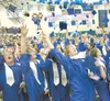 Palmer High School class of 2009 graduates throw their
mortarboards in the air after their graduation ceremony in the PHS
gymnasium. (Frontiersman file photo)