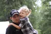 Three-time Iditarod Trail Sled Dog Race champion Dallas Seavey and his daughter Annie, 4, at theIditarod Volunteer Appreciation Picnic Saturday at Iditarod Headquarters on Knik-Goose Bay Road
