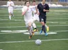 Palmer junior Glen Woodworth chases a loose ball down the field during the first half of a 4-1 loss to North Pole April 11 at Palmer High School. Jeremiah Bartz