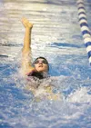 ROBERT DeBERRY/Frontiersman Colony’s Kayla Anderson competes in
the finals of the girls 200-yard individual medley event at the
Region III Swimming and Diving Championships Saturday at Palmer