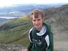 Colony High School senior and track team member Jonathan Sindorf smiles during a hike up Lazy Mountain last summer. Sindorf ran the Iron Dog for the first time this year with his father Paul 