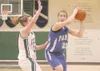 JEREMIAH BARTZ/Frontiersman Palmer sophomore Kendal Venzke tries
to work the ball away from Colony senior Alex Coon during Palmer’s
32-22 loss to the Knights