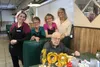 Local WWII veteran Stu Bowdoin celebrates his 100th birthday with Mat-Su Family Restaurant staff and his son, James. Jacob Mann/Frontiersman.com