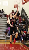 Houston's Cody Wyrick goes to the basket during a win over Nikiski. Ron Jones/matsusports.net
