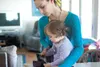 Jessica Smith and her 15-month-old daughter Violet Plummer look at a picture of Michael Plummer Monday afternoon in their home off Knik-Goose Bay Road. Smith is Plummer's fiancée and Violet t