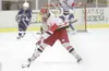 Wasilla's Michael Johnston moves the puck across the ice
Thursday against East during the ASAA/First National Bank State
Hockey Tournament at the Curtis C Menard II Memorial Ice Arena.
(ROBER