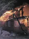 Big Lake resident Paul Hampton lost his 6,000-square-foot house
in a fire that began early Sunday morning. Fire crews from across
the borough fought the blaze for almost 12 hours. The house w