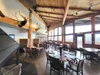 Good food, friendly service, and great views of Knik Arm and the Chugach Mountains await diners at Settlers Bay Lodge. Photo courtesy of Settlers Bay Lodge