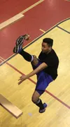 Will Byrd, a Burchell High School junior, makes contact with the ball during the one foot high kick competition at the Native Youth Olympics district meet at Houston Middle School Friday afte
