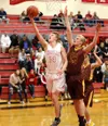 Wasilla’s Luke Devine goes to the basket against Dimond during the 2018 Doc Larson Roundball Classic. The 2019 tourney starts Wednesday. Courtesy of Bruce Eggleston/matsusports.net/