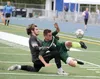 Kenai goalkeeper Wren Norwood collides with Colony forward Ben Sande after Norwood rushed out of the penalty box to try to play the ball during Colony's 4-1 win over Kenai in the Northern Lig