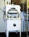 The "Dutchess," which cuts biscuits, was patented in 1931. It is
still used at the central kitchen. Photo by JEN
RANSOM/Frontiersman.
