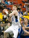 Palmer senior forward Brian Selmer drives to the baskset for two points during Palmer's win over Thunder Mountains during Friday's competition at the ASAA/First National Bank 3A/4A State Bask