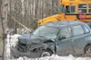 ROBERT DeBERRY/Frontiersman A vehicle sits in the ditch off
Grumman Circle after a head-on collision with a First Student
School bus Monday afternoon. This is at least the third bus
accident 