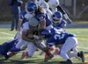 Palmer senior Nick DeBach leads a group of Palmer tacklers to stop Soldotna's Austin Schrader during a 49-13 loss to the Stars in the ASAA First National Bowl medium-schools state championshi