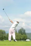 MATT TUNSETH/Frontiersman San Diego professional golfer Aaron
Dexheimer hits his drive on the 15th hole Saturday at Palmer Golf
Course. Dexheimer fired a four-under 68 in the third round to t
